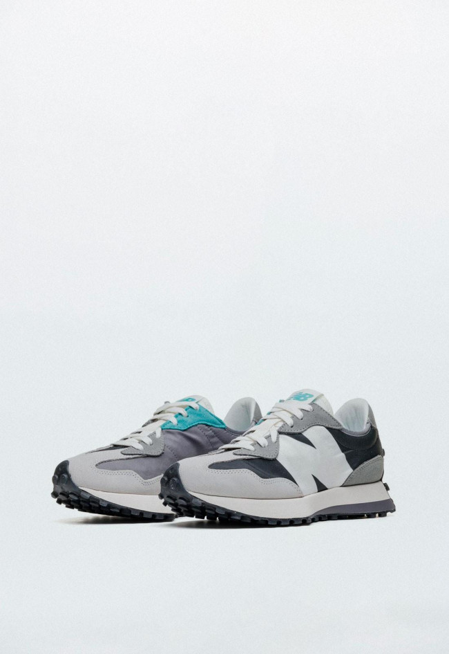 Deportivo de hombre gris New Balance 327