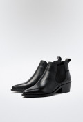 Botín cowboy de mujer en piel negra con elásticos laterales | Estilo western elegante y versátil GLO Bahía