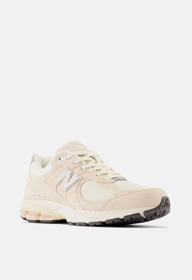 Deportivo de mujer beige New Balance m2002rcc