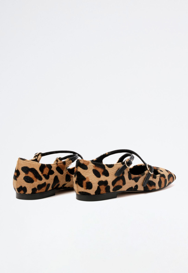 Bailarina de mujer leopardo Glo cruces heg