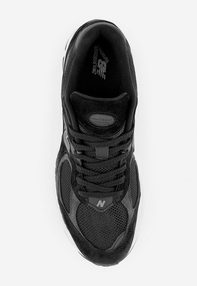 Zapatilla de mujer New Balance negra con tecnología ABZORB y diseño retro 2000s | Confort deportivo y estilo urbano