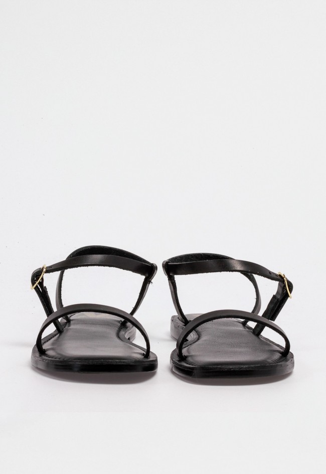 Sandalia plana de piel negra con diseño minimalista de tiras finas y cierre de hebilla en el tobillo VAS rsp-11010