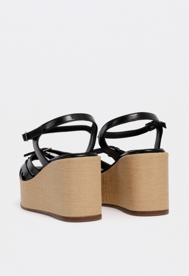 Sandalia de piel negra con cuña y plataforma efecto rafia — estilo y altura con comodidad Dansi 7556
