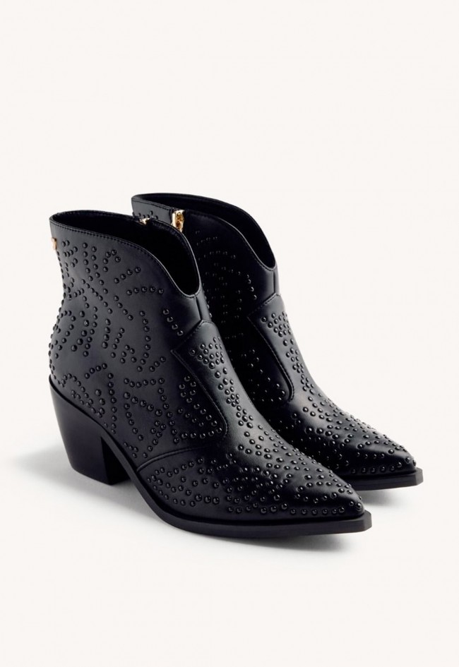 Botines Gioseppo Shelvin cowboy negros con tachuelas al tono – actitud rebelde con elegancia