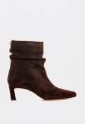 Botines de mujer en piel marrón con tacón fino — elegancia natural y estilo atemporal