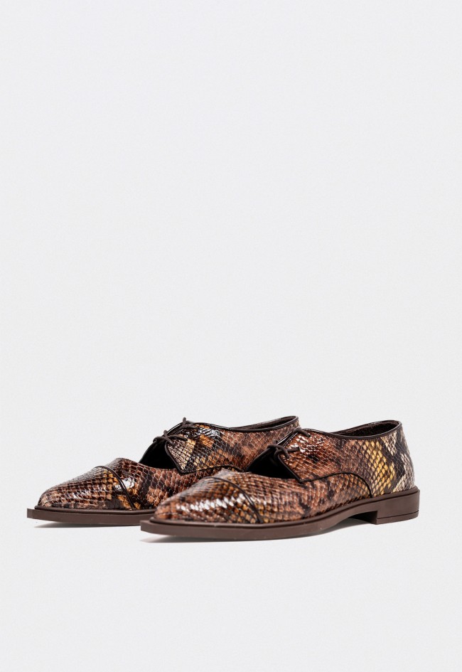 Zapatos planos mujer Glo 59003 de piel efecto serpiente, elegancia versátil con carácter