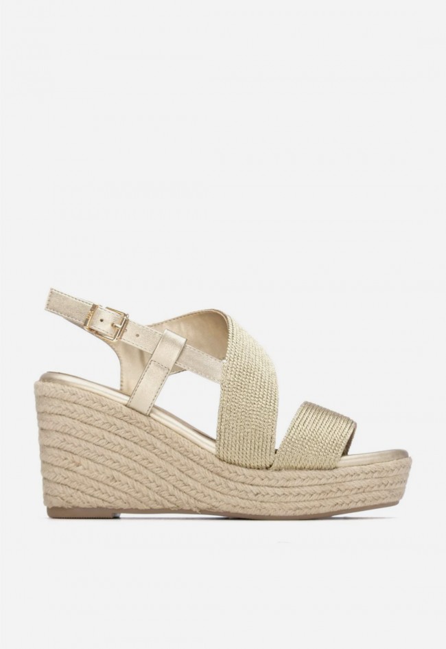 Sandalia cuña Xti 14533501 dorada: brillo elegante y confort absoluto