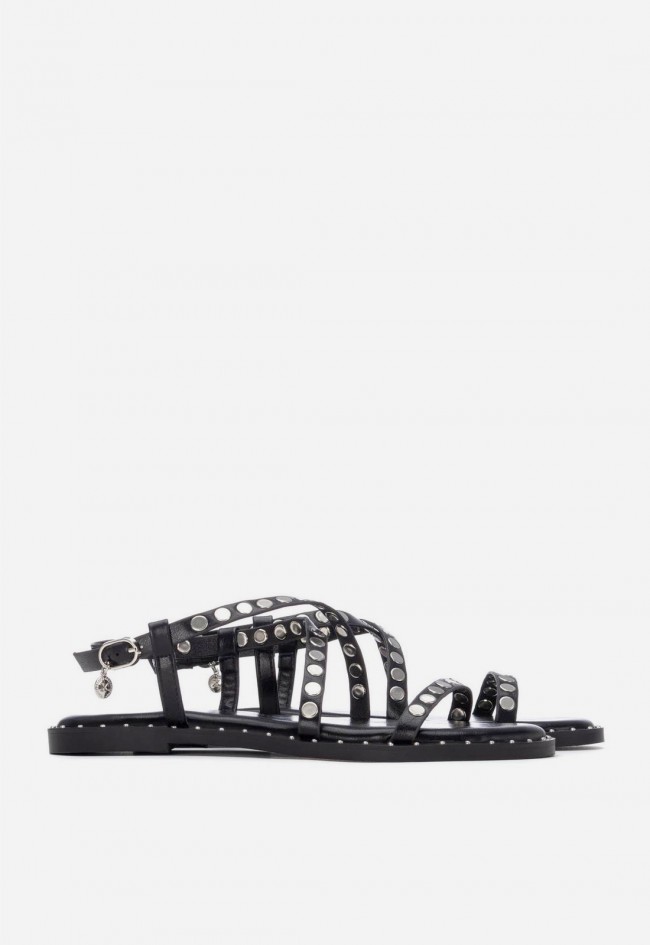 Sandalias planas negras Xti con tachuelas: estilo versátil y tendencia para diario