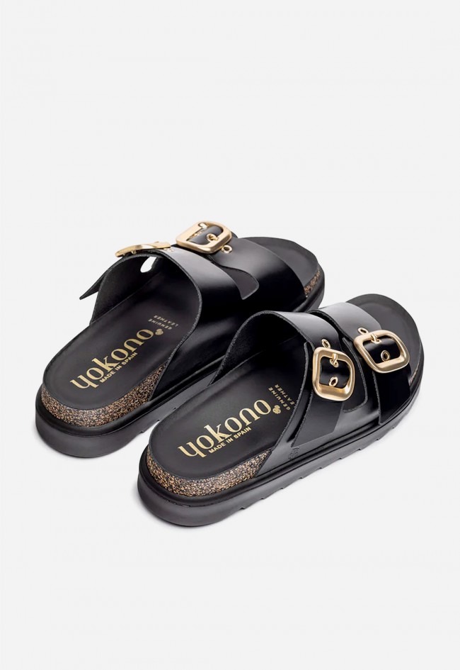 Sandalia de plataforma mujer Yokono TUNEZ-130 en piel negra con hebillas doradas para un look urbano chic