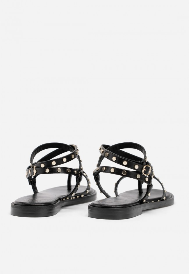 Sandalia plana VAS de piel negra con tachuelas para un estilo boho sofisticado