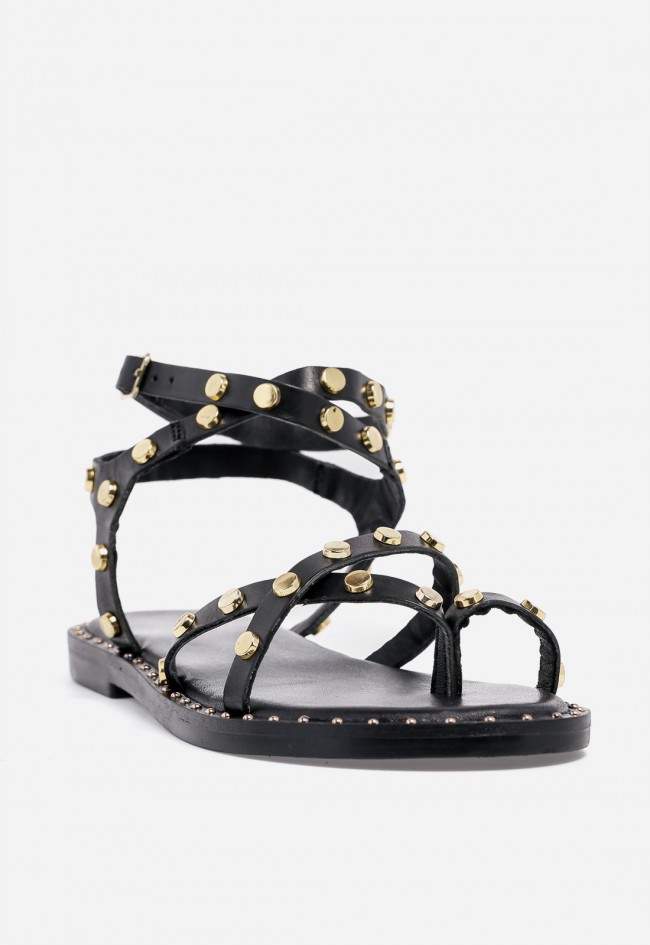 Sandalia plana de mujer VAS en piel negra con tachuelas, actitud chic para el verano