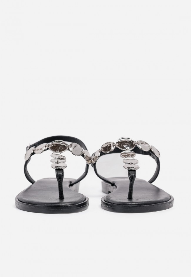 Sandalia plana de mujer VAS en piel negra con detalle joya, elegancia effortless para brillar cada día