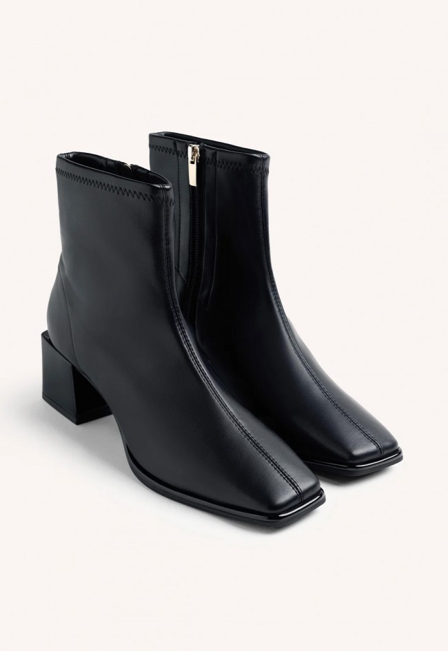 Botines elásticos de mujer Gioseppo negros con tacón escultórico, estilo y comodidad