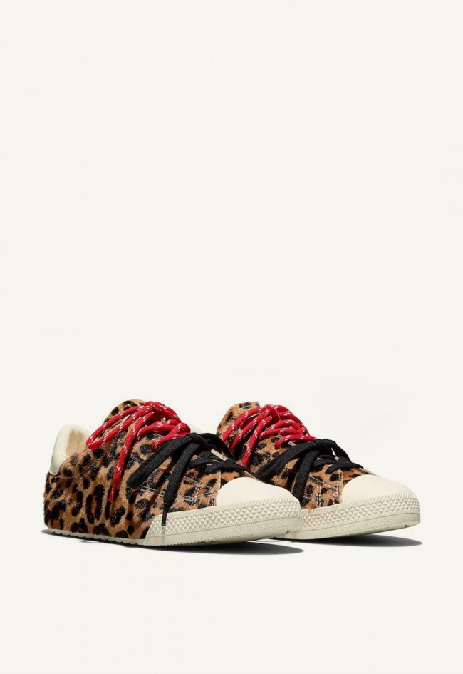Zapatillas Converse Chuck Taylor Lo de mujer con estampado de leopardo, estilo atrevido