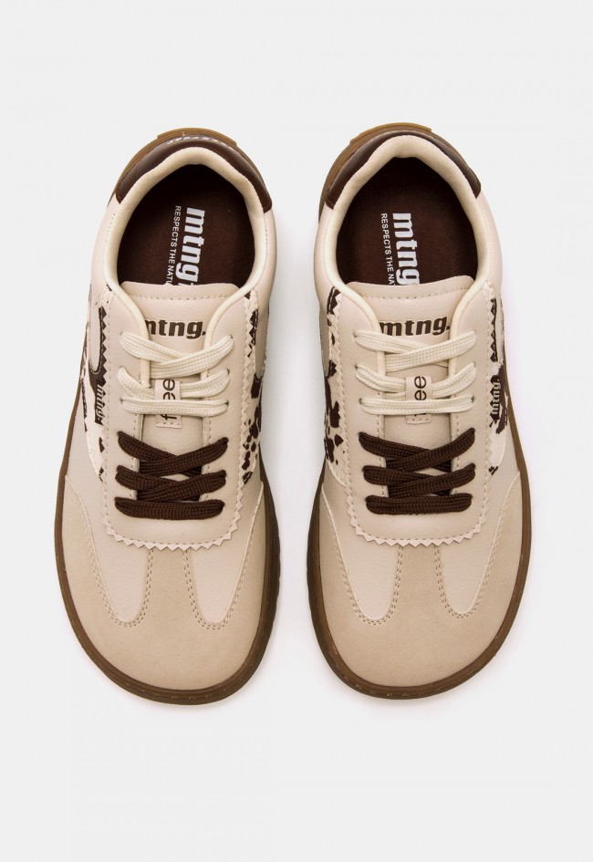Zapatilla barefoot Mustang Free Alask de mujer beige con estampado de vaca