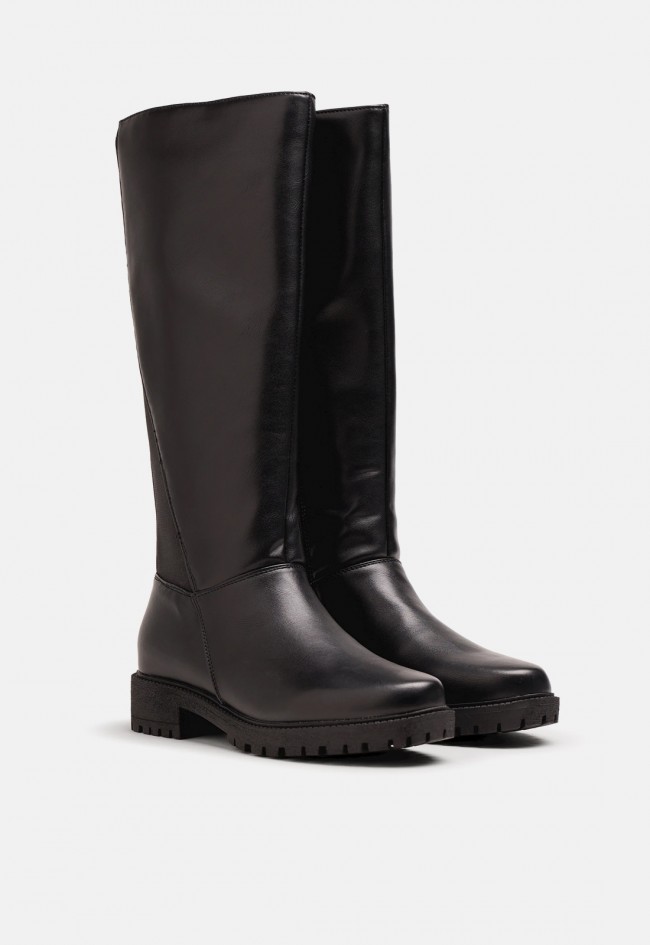 Bota alta Mustang Campa negra de mujer con tacón bajo | Un básico elegante para el invierno