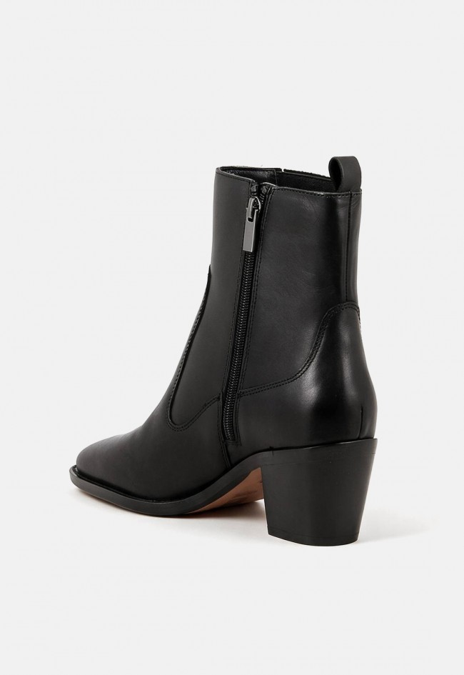 Botines camperos Another Trend 5653 de mujer en piel negra | Estilo western con carácter